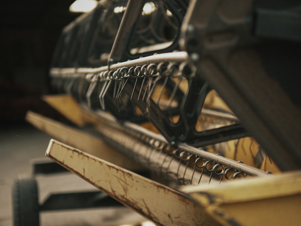 a close up of a row of metal benches