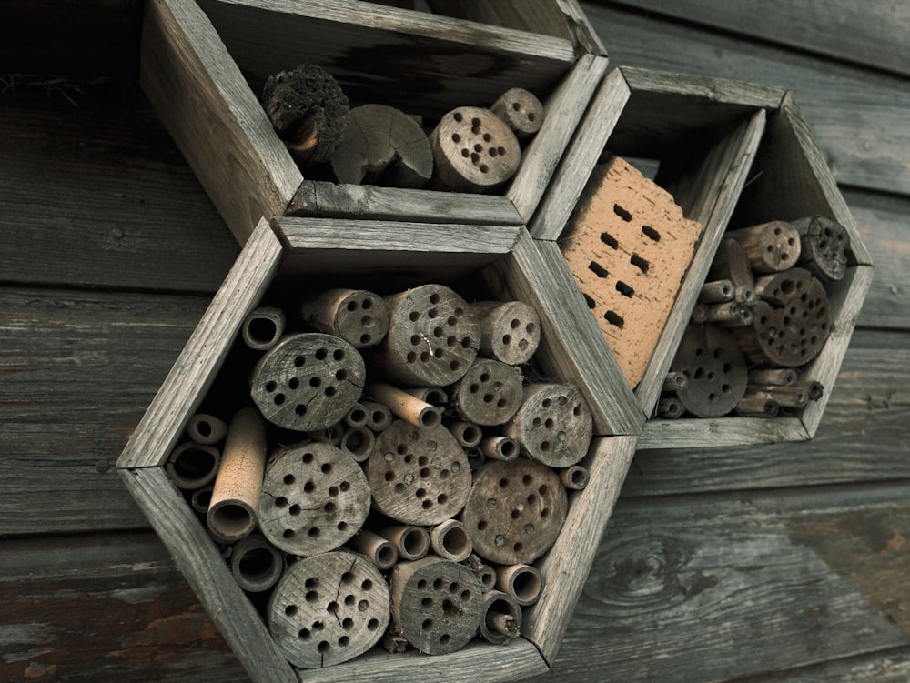 a bunch of holes in the side of a building