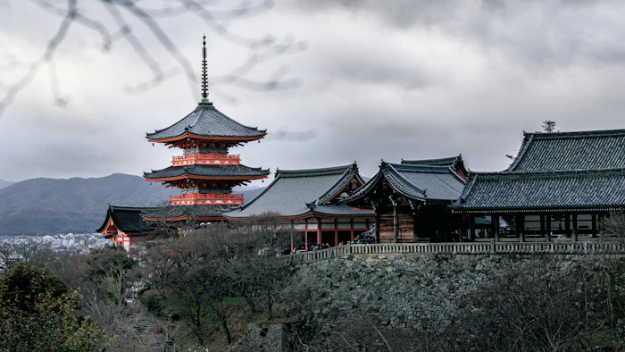 A temple building on a lush green hillside