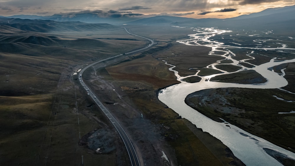 an aerial view of a river running through a valley