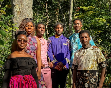 a group of people standing next to each other