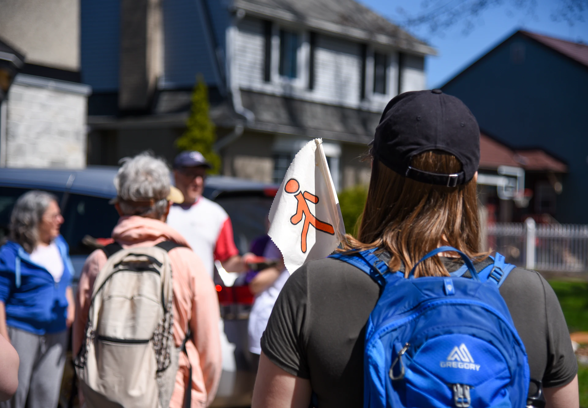 a group of people walking down a street
