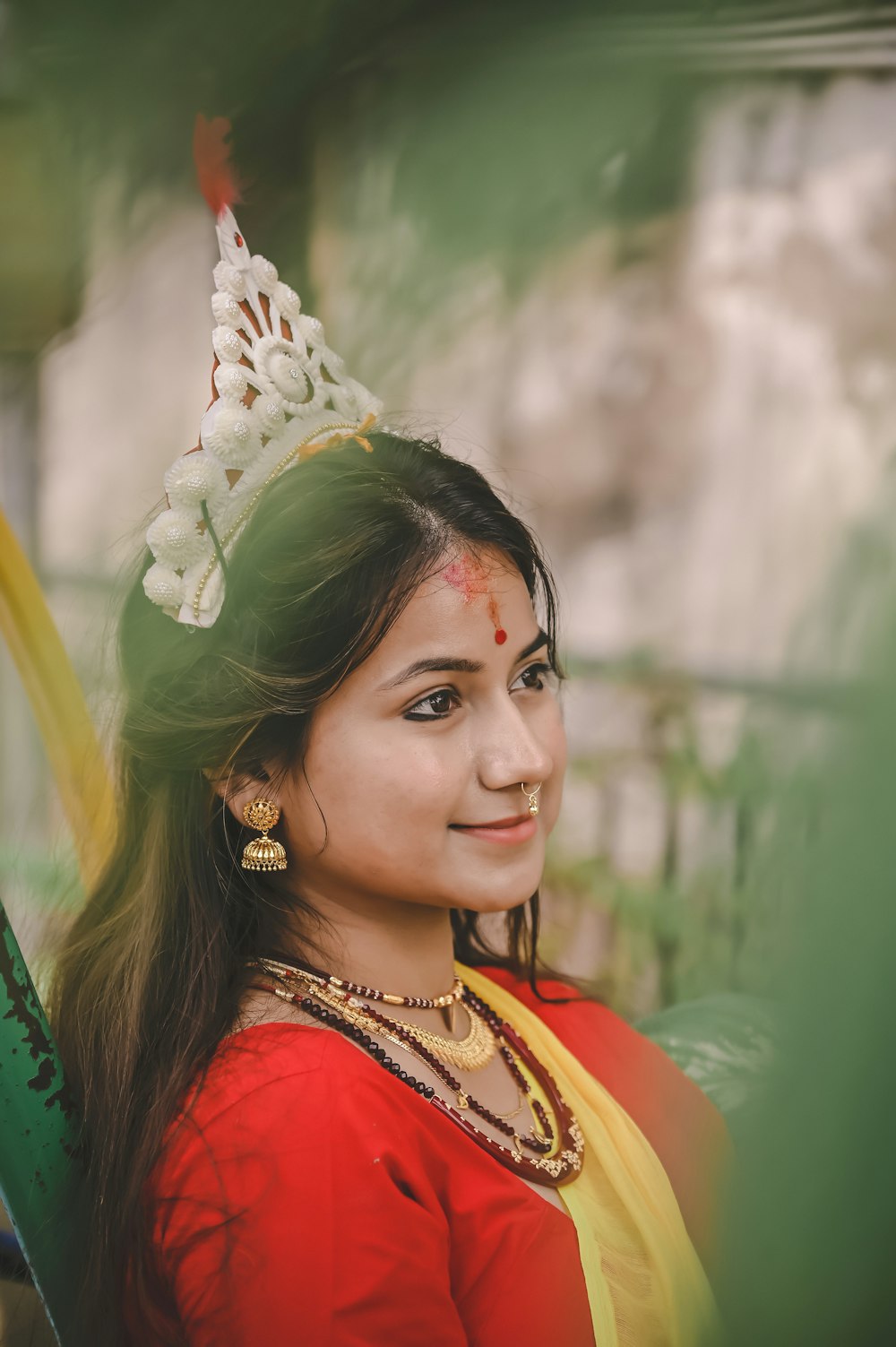 a woman in a red and yellow outfit