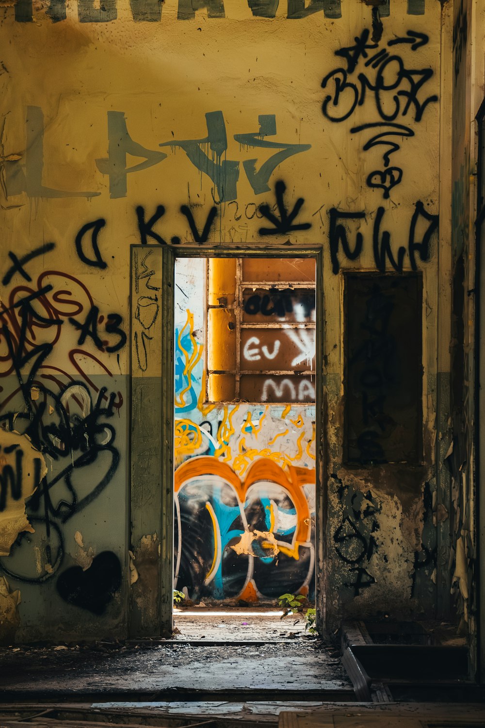 a doorway that has graffiti all over it