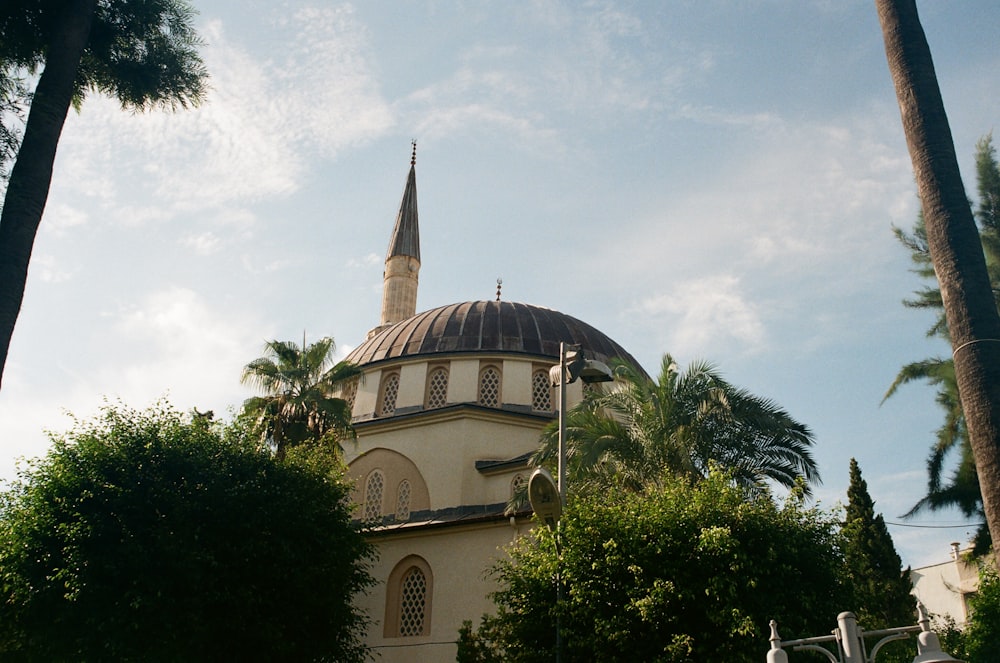 a large white building with a dome on top of it