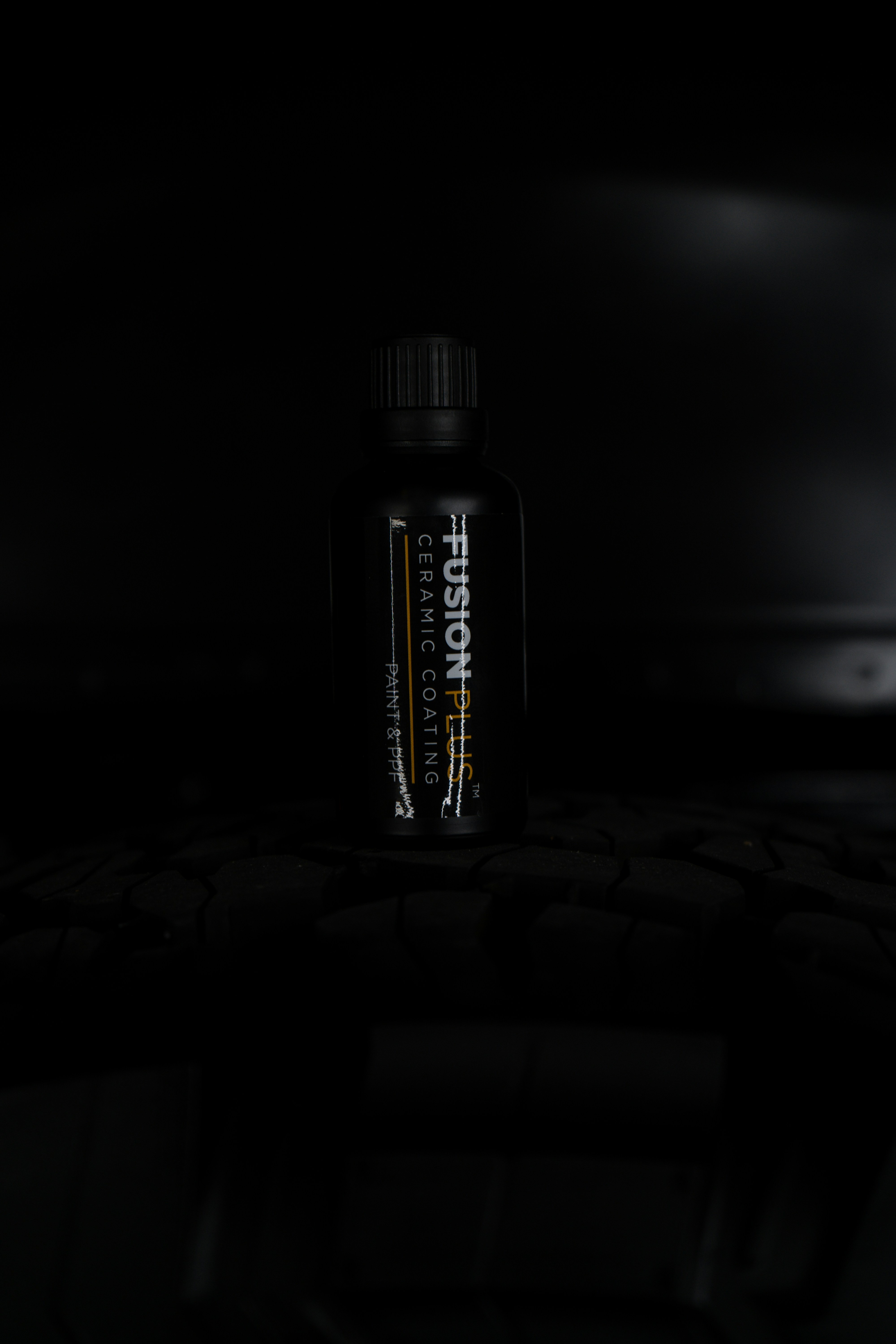 a bottle of energy drink sitting on top of a table