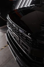 a close up of the front grille of a car