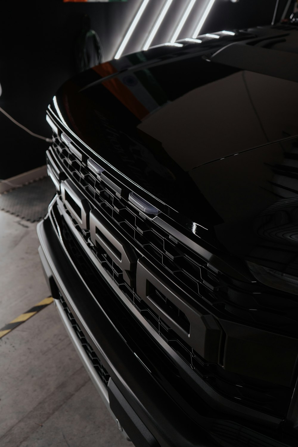 a close up of the front grille of a car