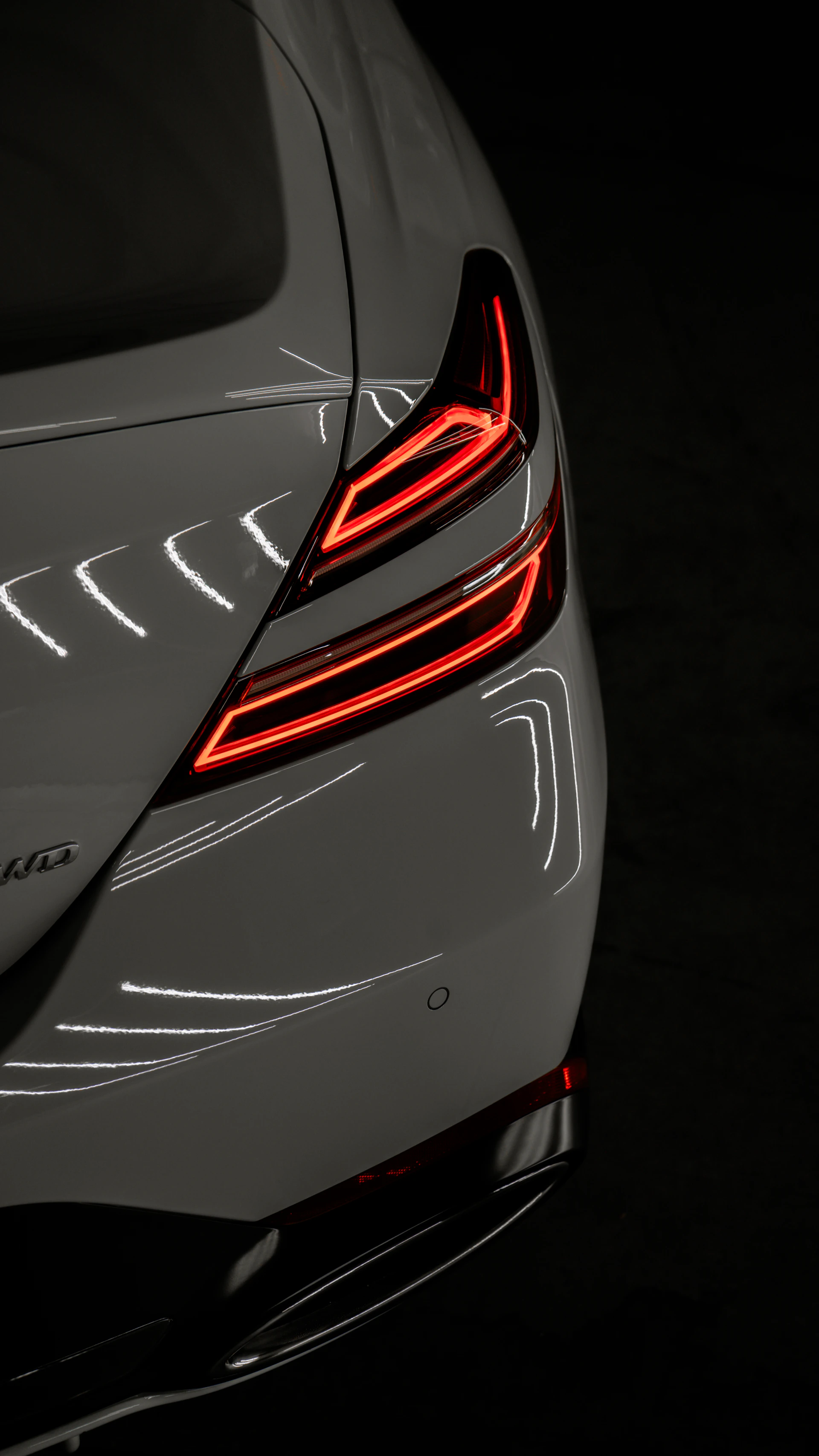 a close up of the tail lights of a car