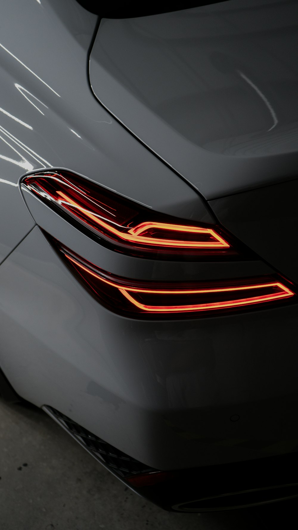 a close up of the tail lights of a car