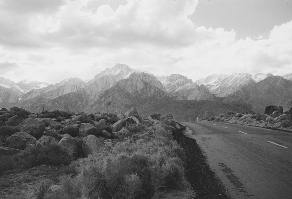 a black and white photo of a mountain range