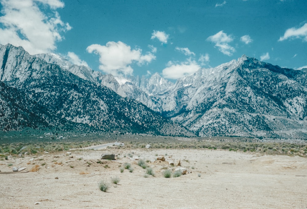 the mountains are covered in snow in the desert