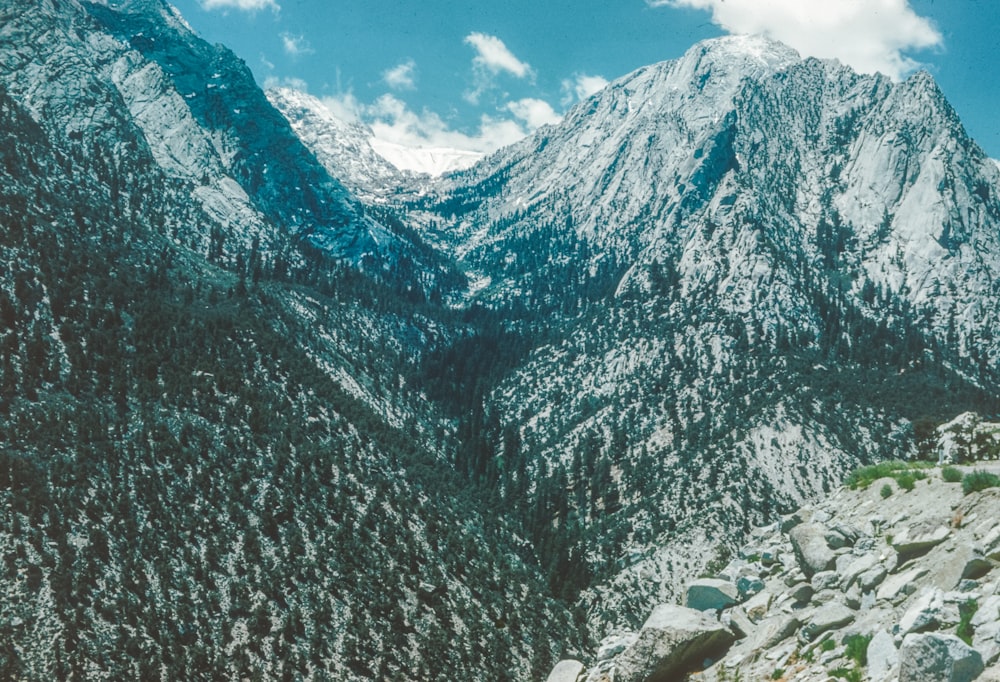 a mountain range with snow on the top of it