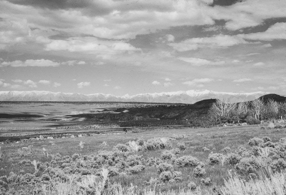 a black and white photo of a mountain range