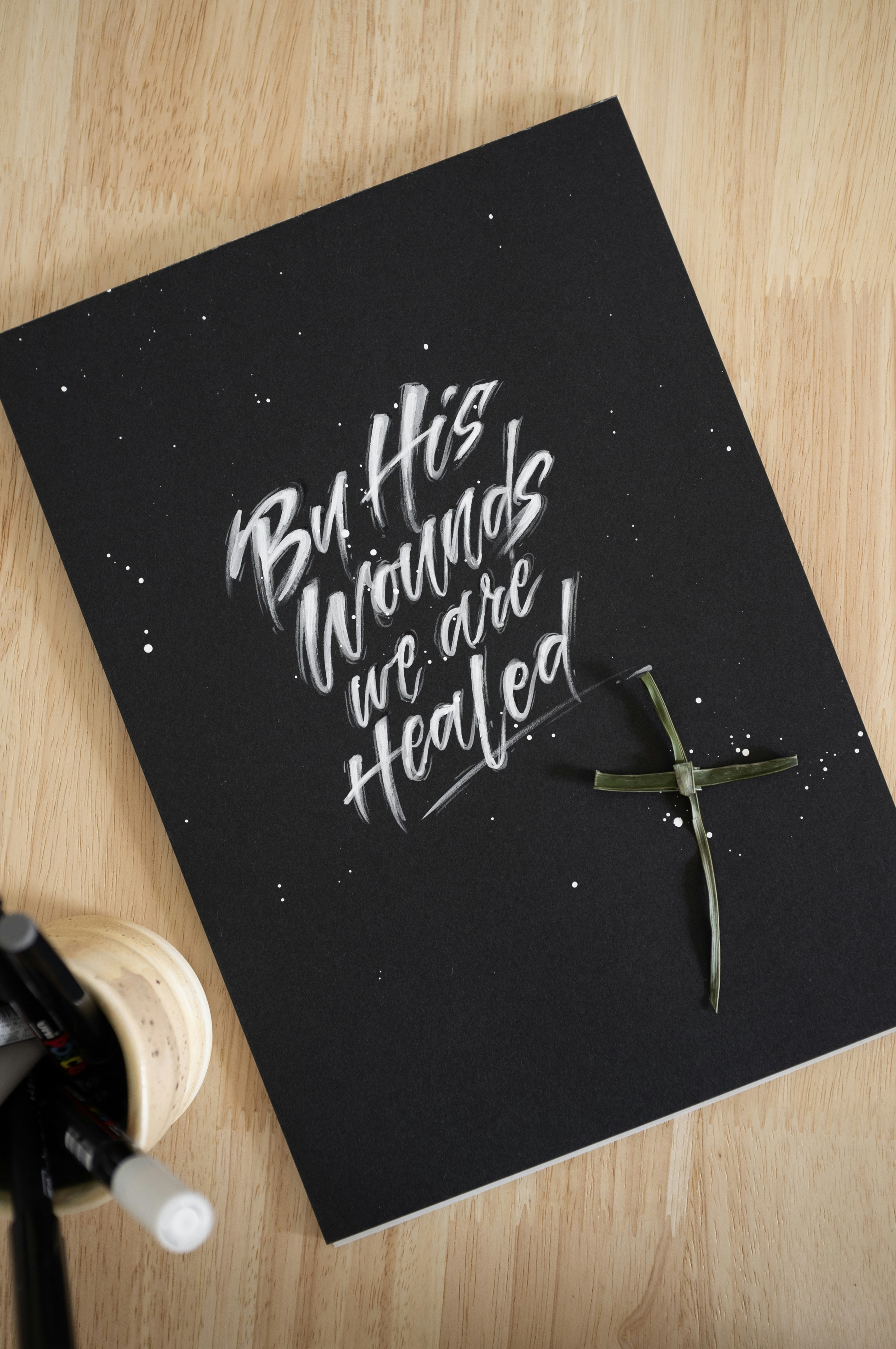 a picture of a cross and a bottle of wine