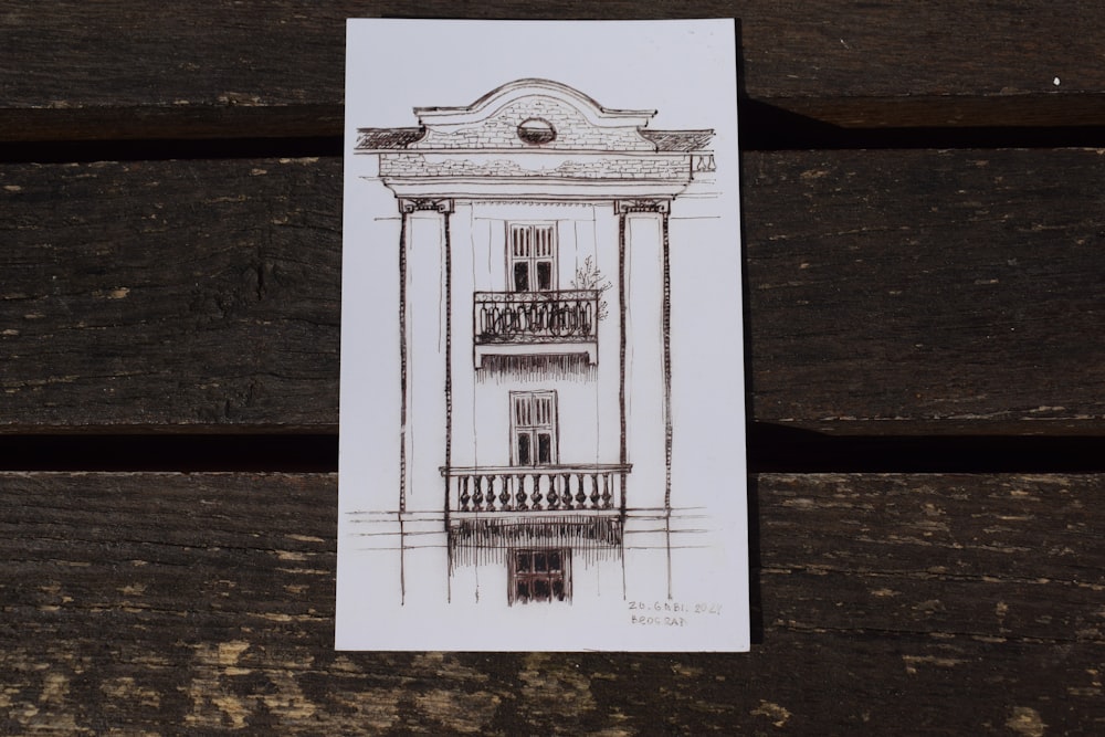 a drawing of a building on a piece of paper