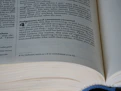 a close up of a book with an open page