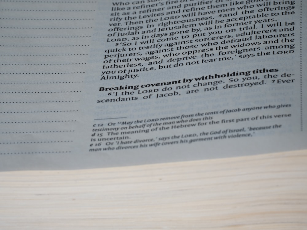 a close up of an open book with text