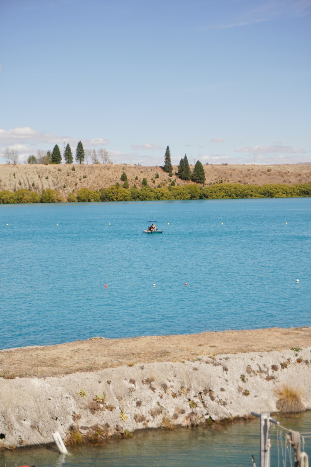 a body of water with a boat in it