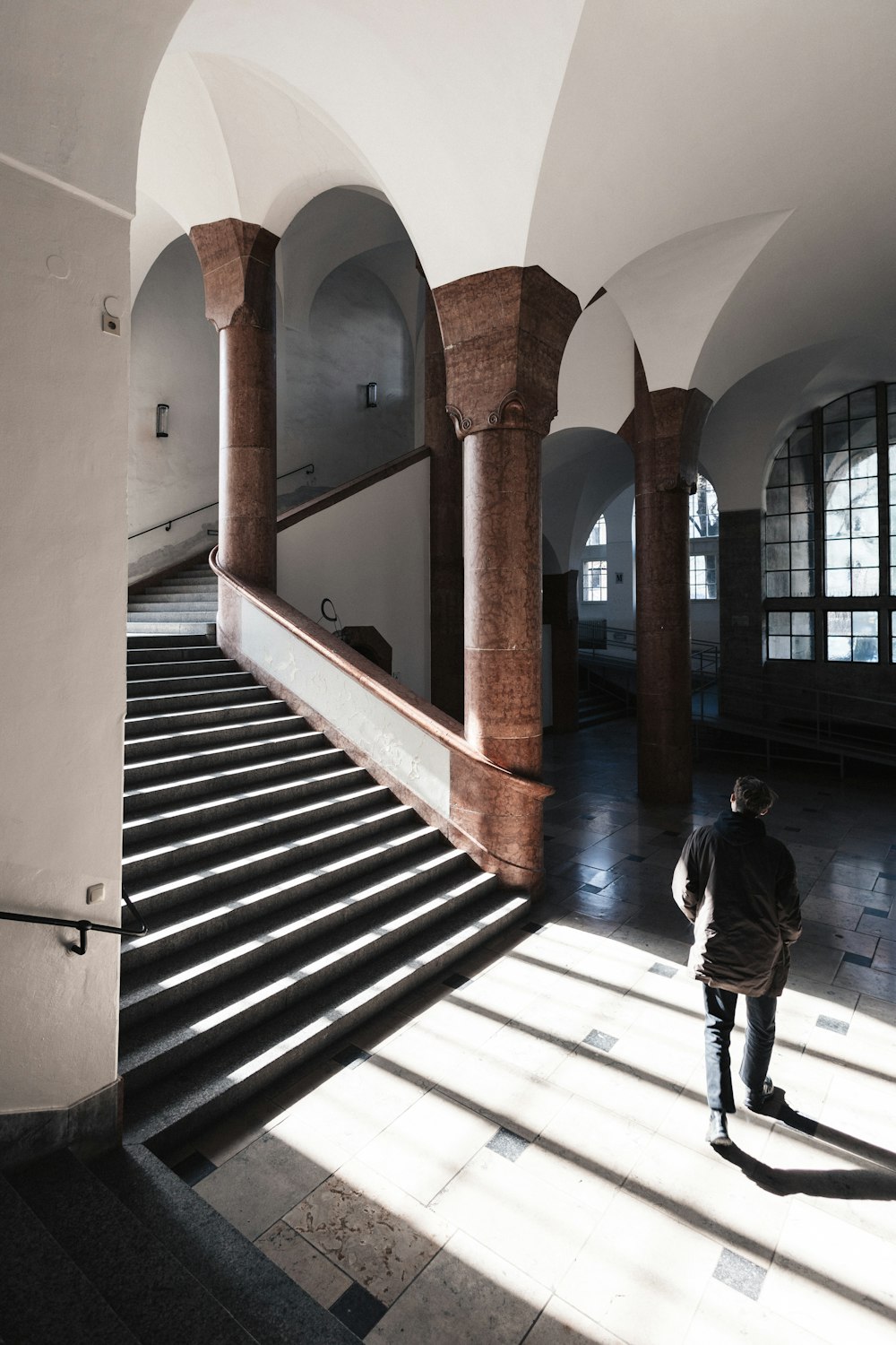 a person walking up a set of stairs