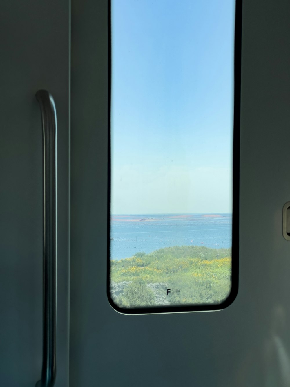 a view of a body of water through a window