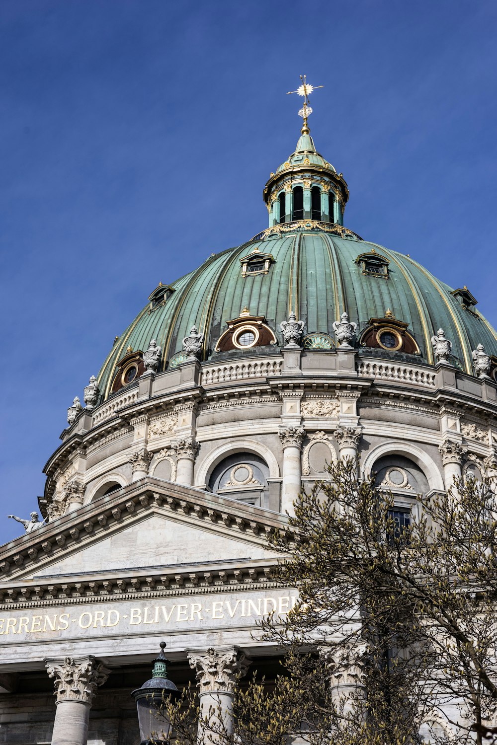 the dome of a building with a cross on top