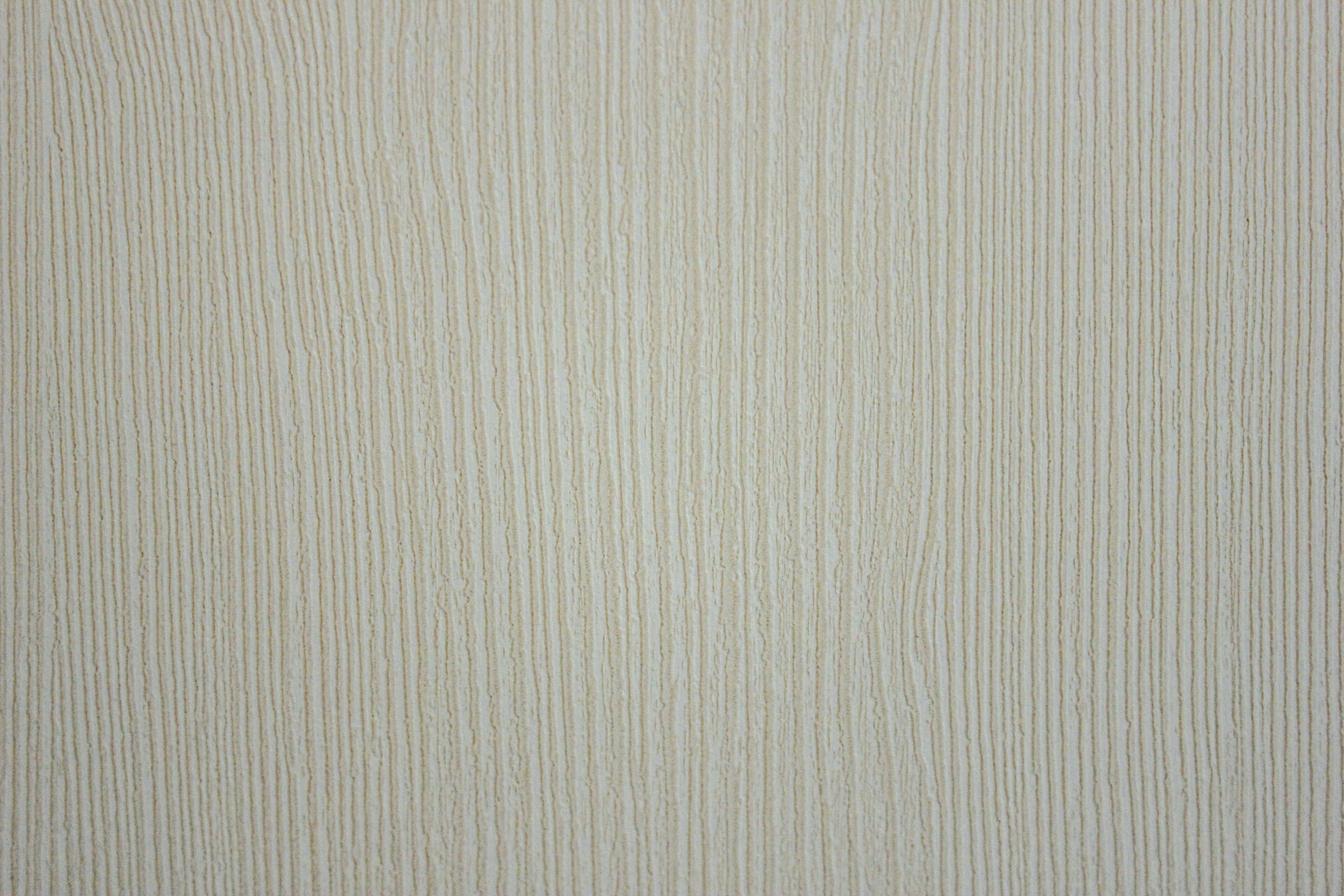 a close up of a white wood texture