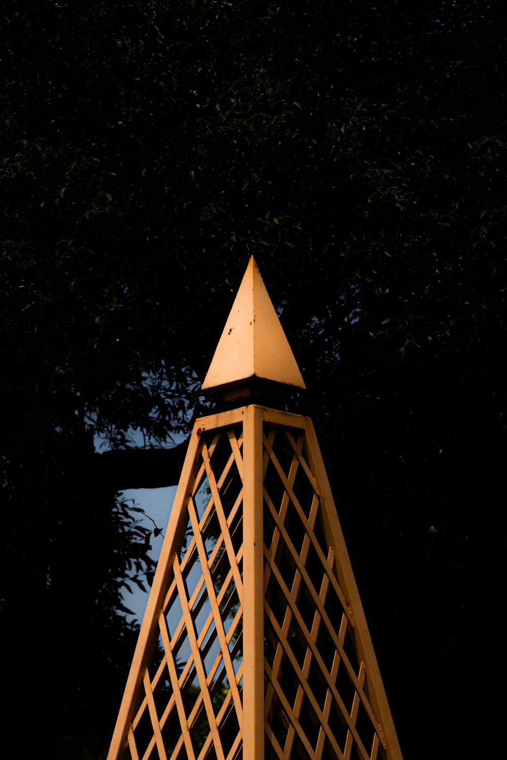 a wooden structure with a clock on top of it