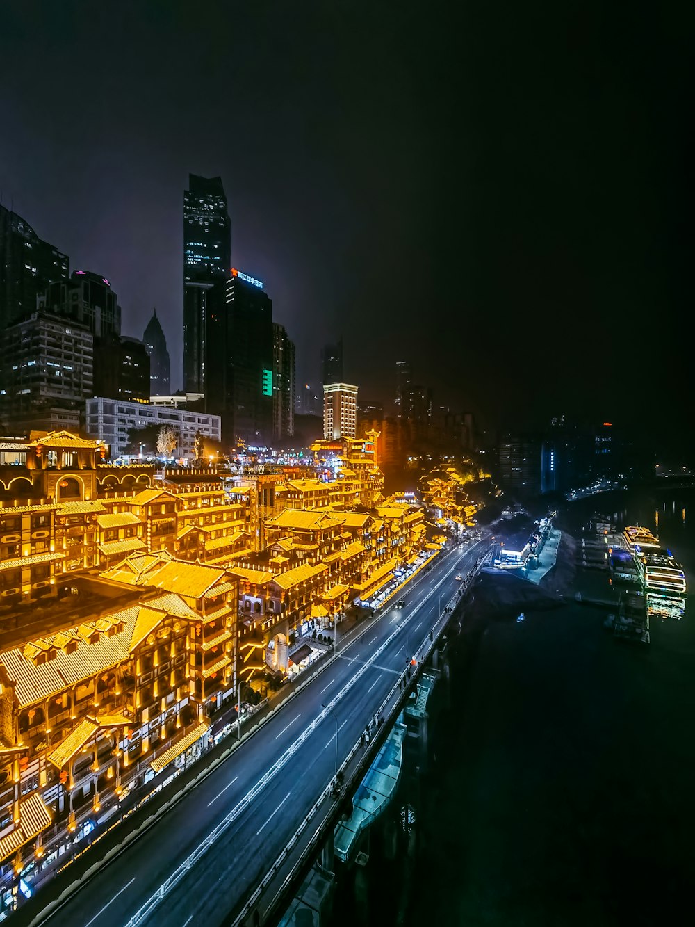 a night view of a city with lots of traffic