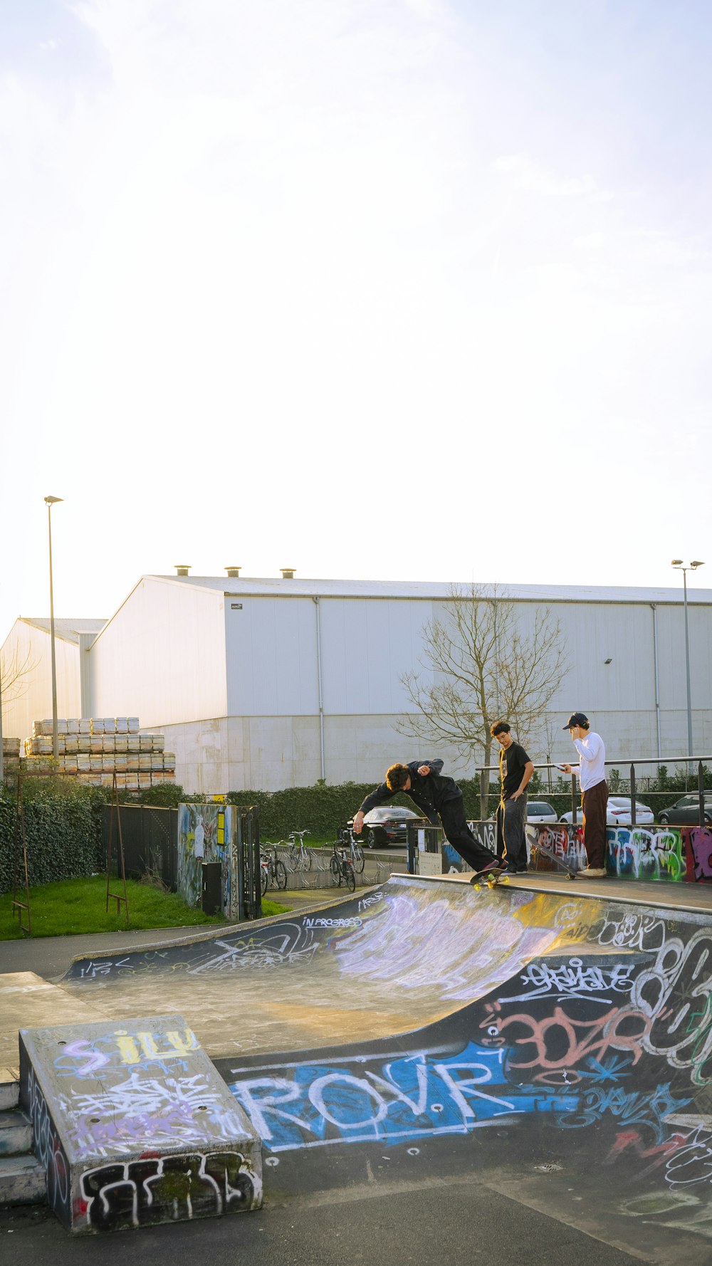 a man riding a skateboard up the side of a ramp