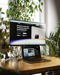 a desktop computer sitting on top of a wooden desk