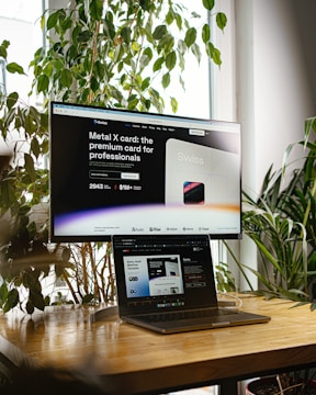 a desktop computer sitting on top of a wooden desk