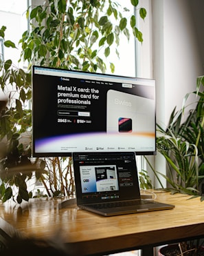 a desktop computer sitting on top of a wooden desk