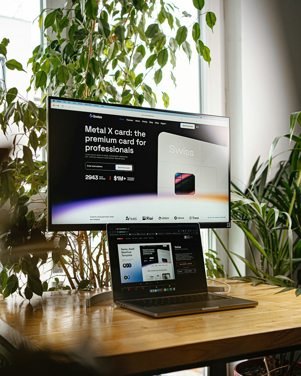 a desktop computer sitting on top of a wooden desk