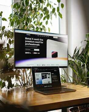 a desktop computer sitting on top of a wooden desk