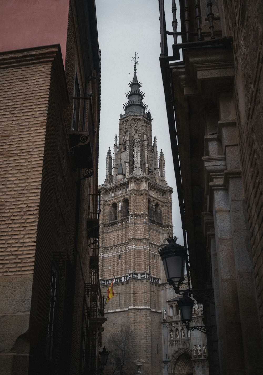 a tall tower with a clock on the top of it