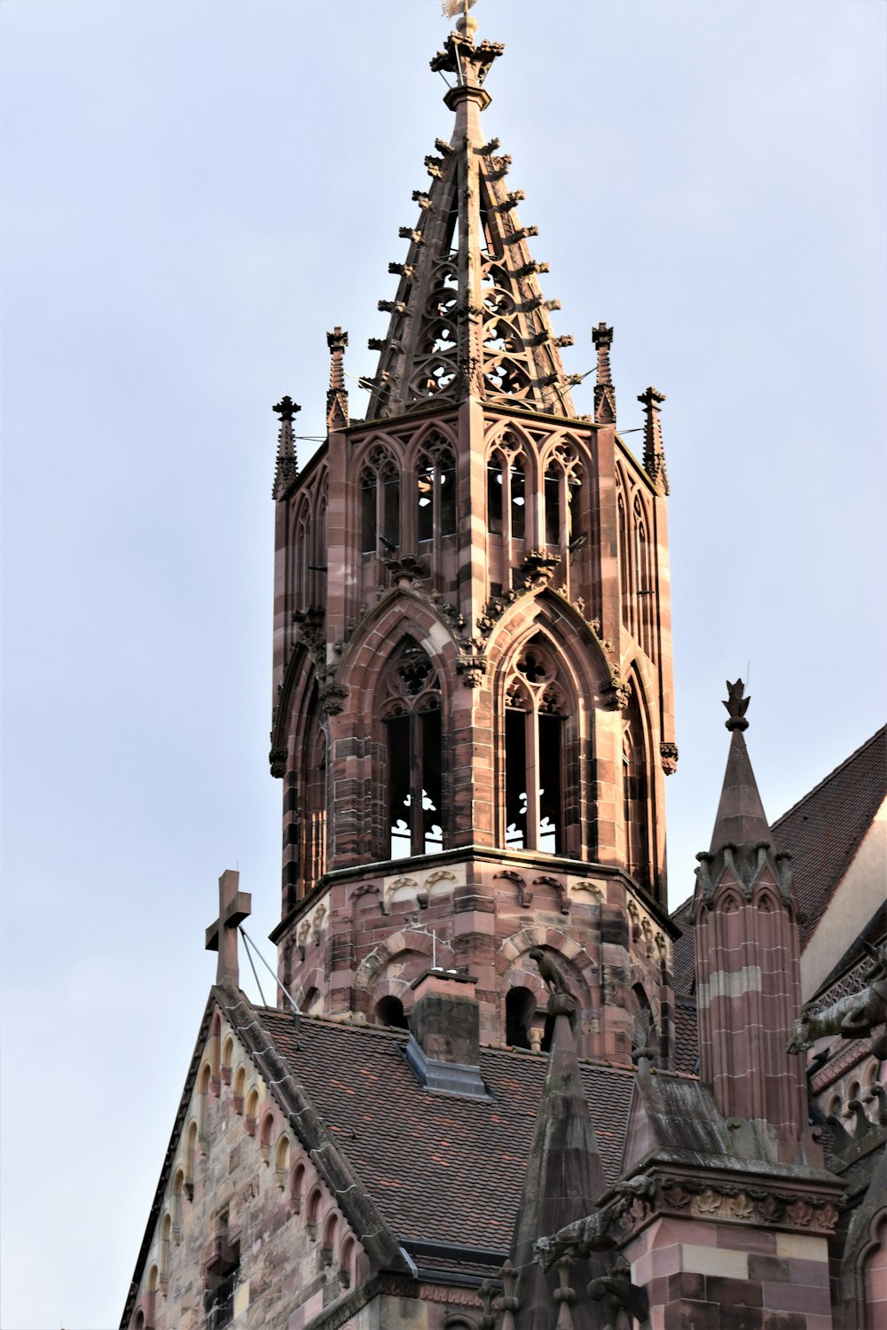 a very tall building with a clock on it's side