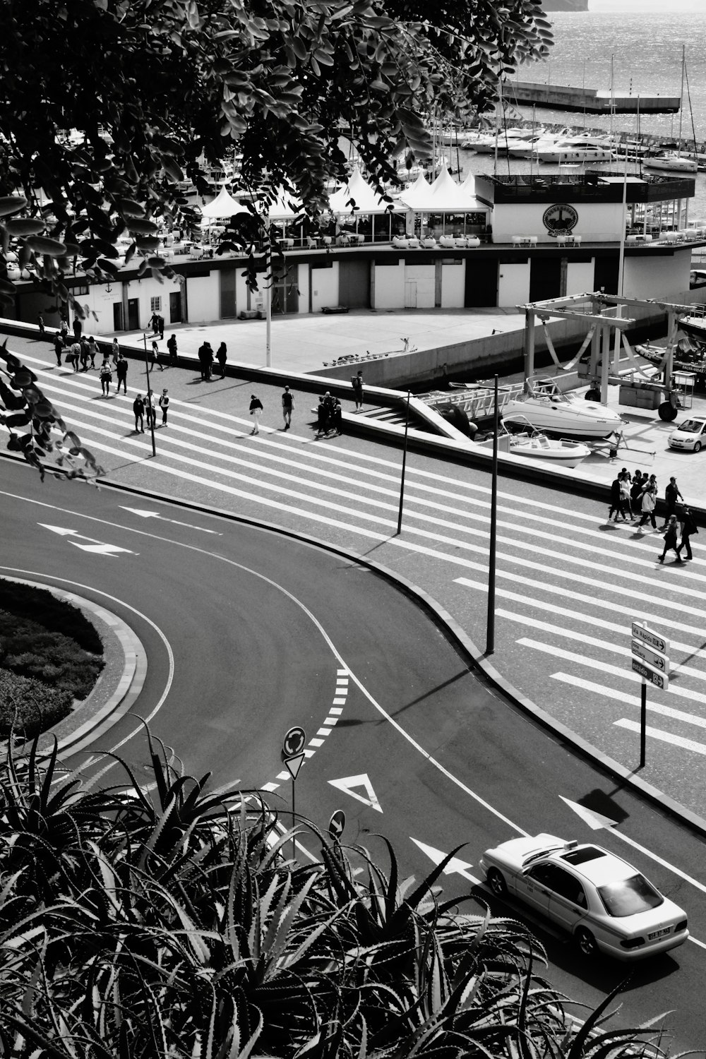 a black and white photo of a busy street