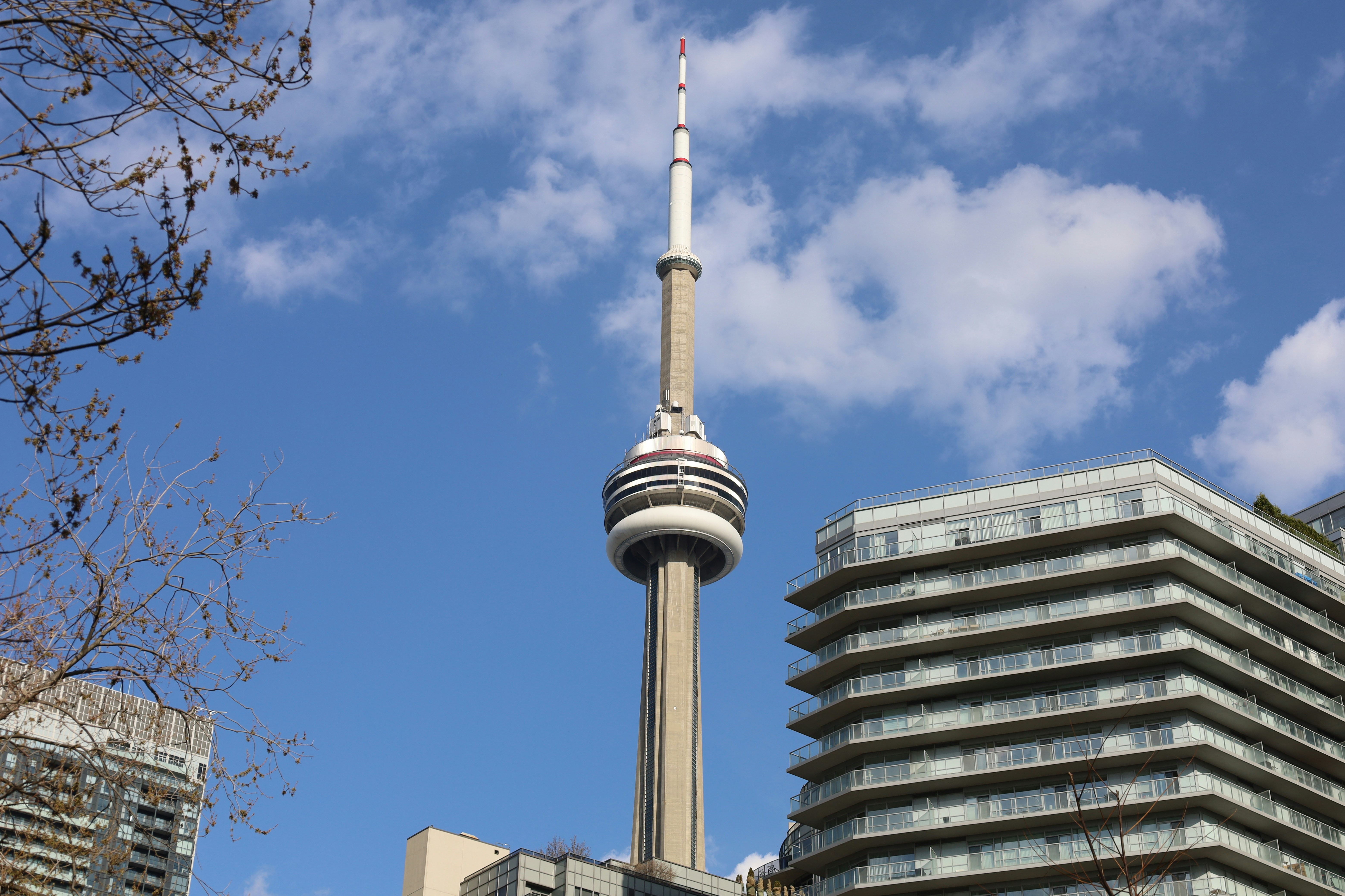 a tall building with a sky scraper in the background