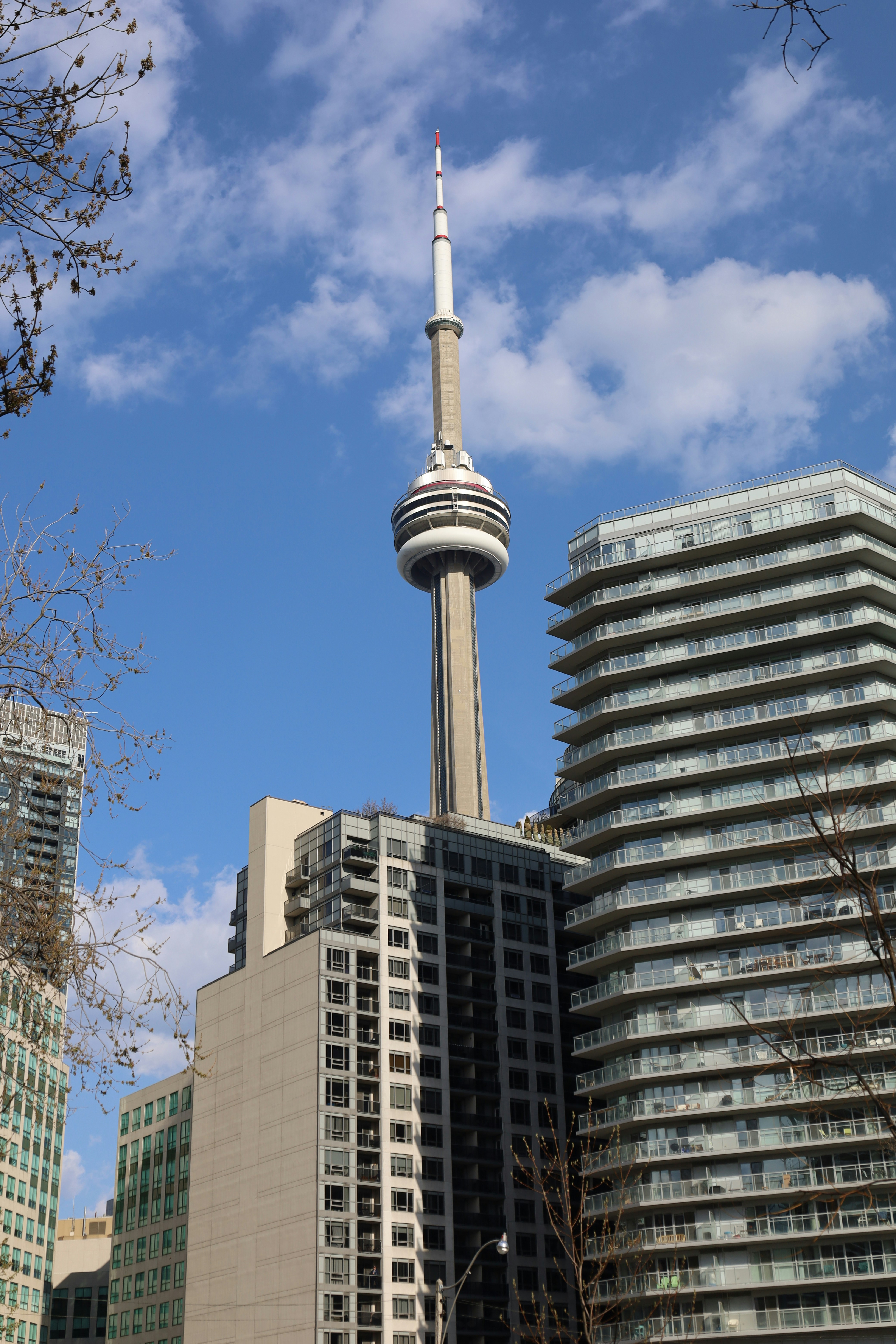 a very tall building with a very tall tower in the background
