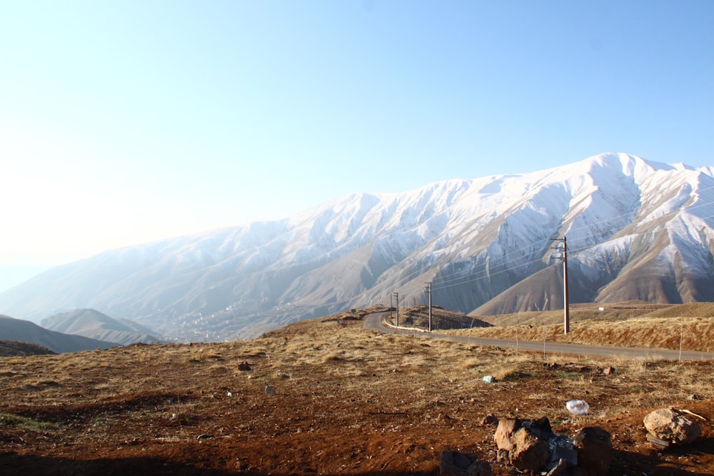 a dirt road in the middle of a mountain range