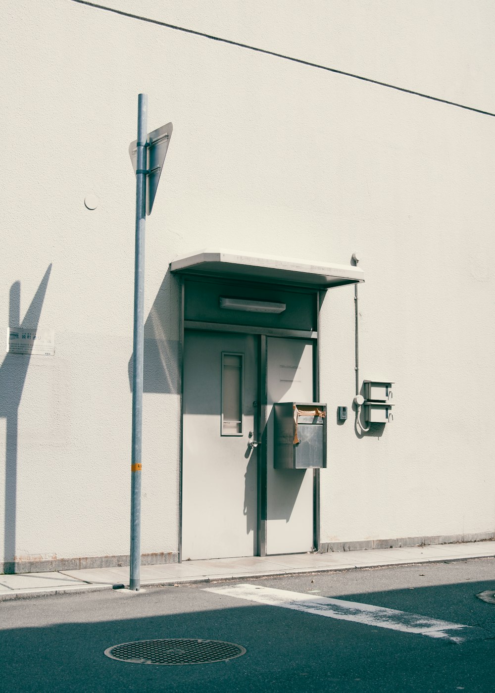 a phone booth on the side of a building