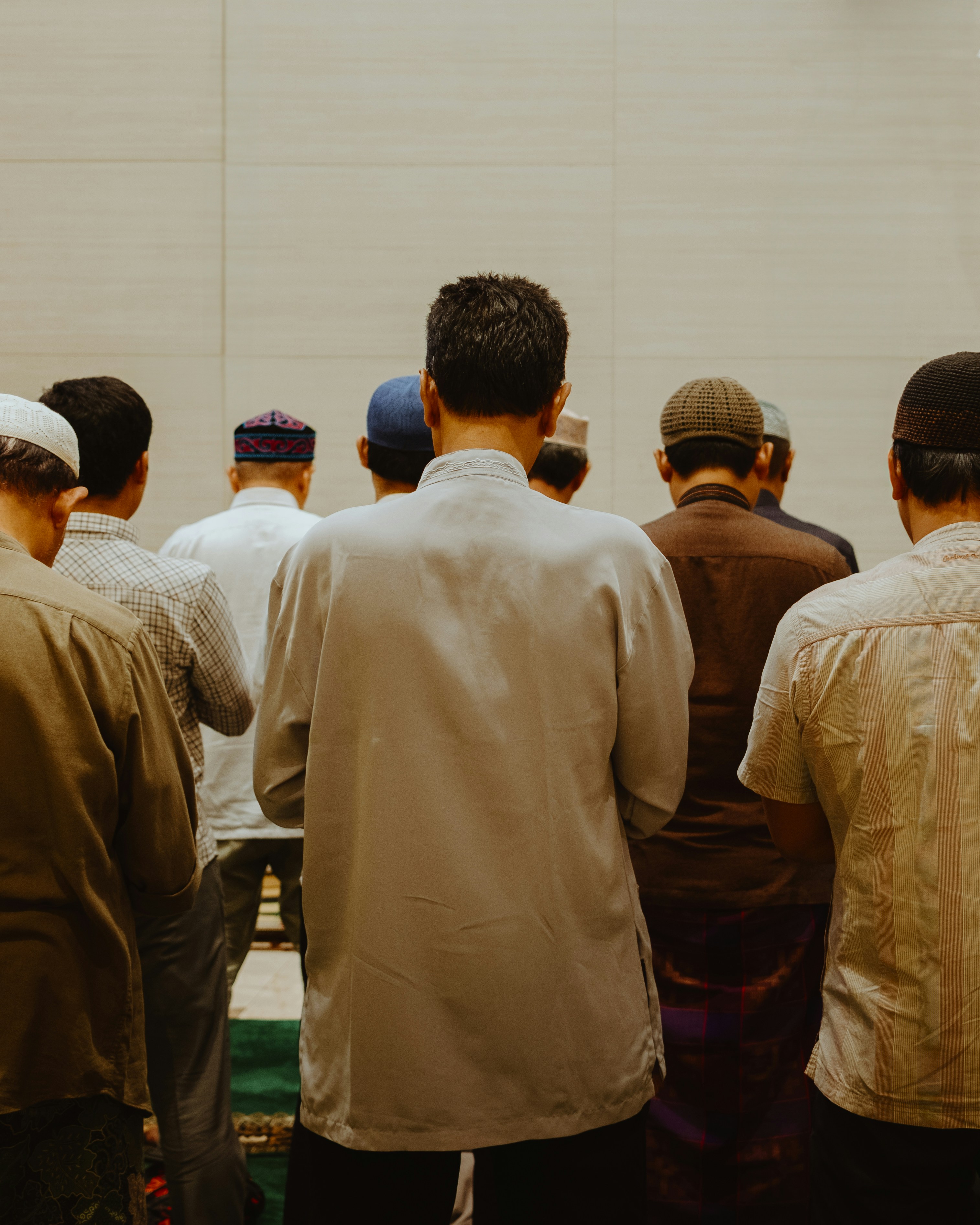 a group of men standing next to each other