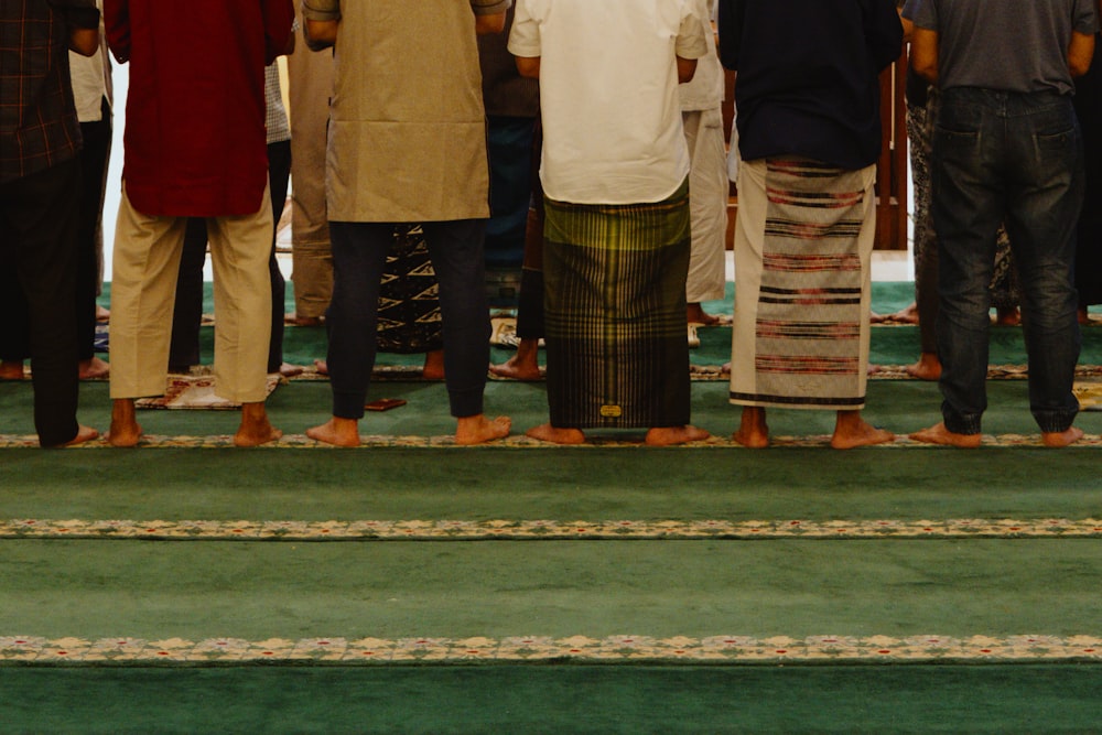 a group of people standing in a room