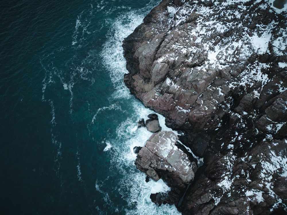 a large body of water surrounded by rocks