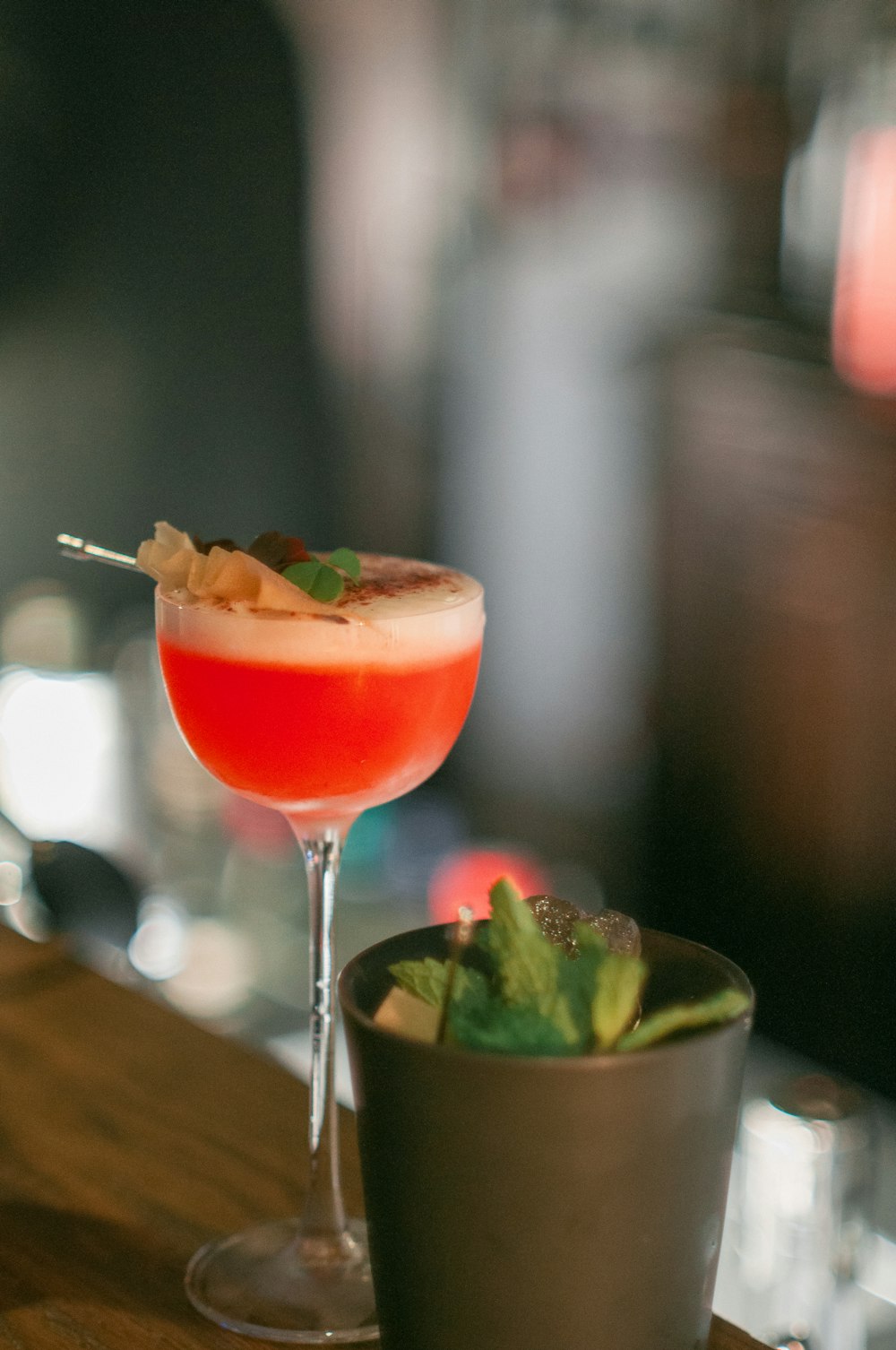 a drink sitting on top of a wooden table