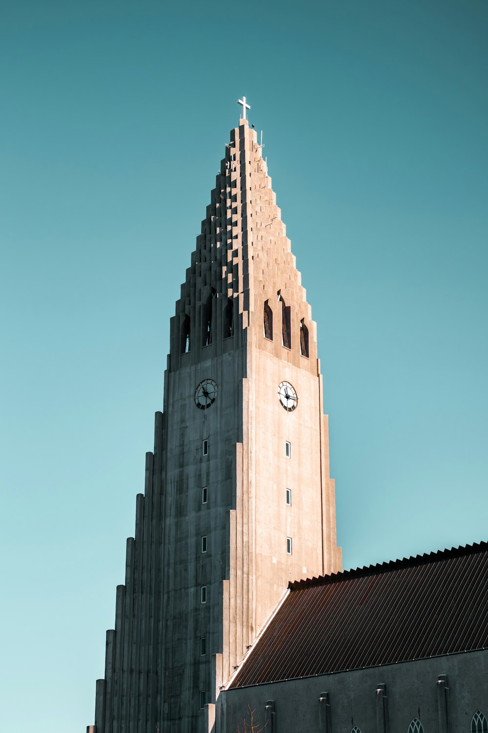 a church steeple with a clock on it