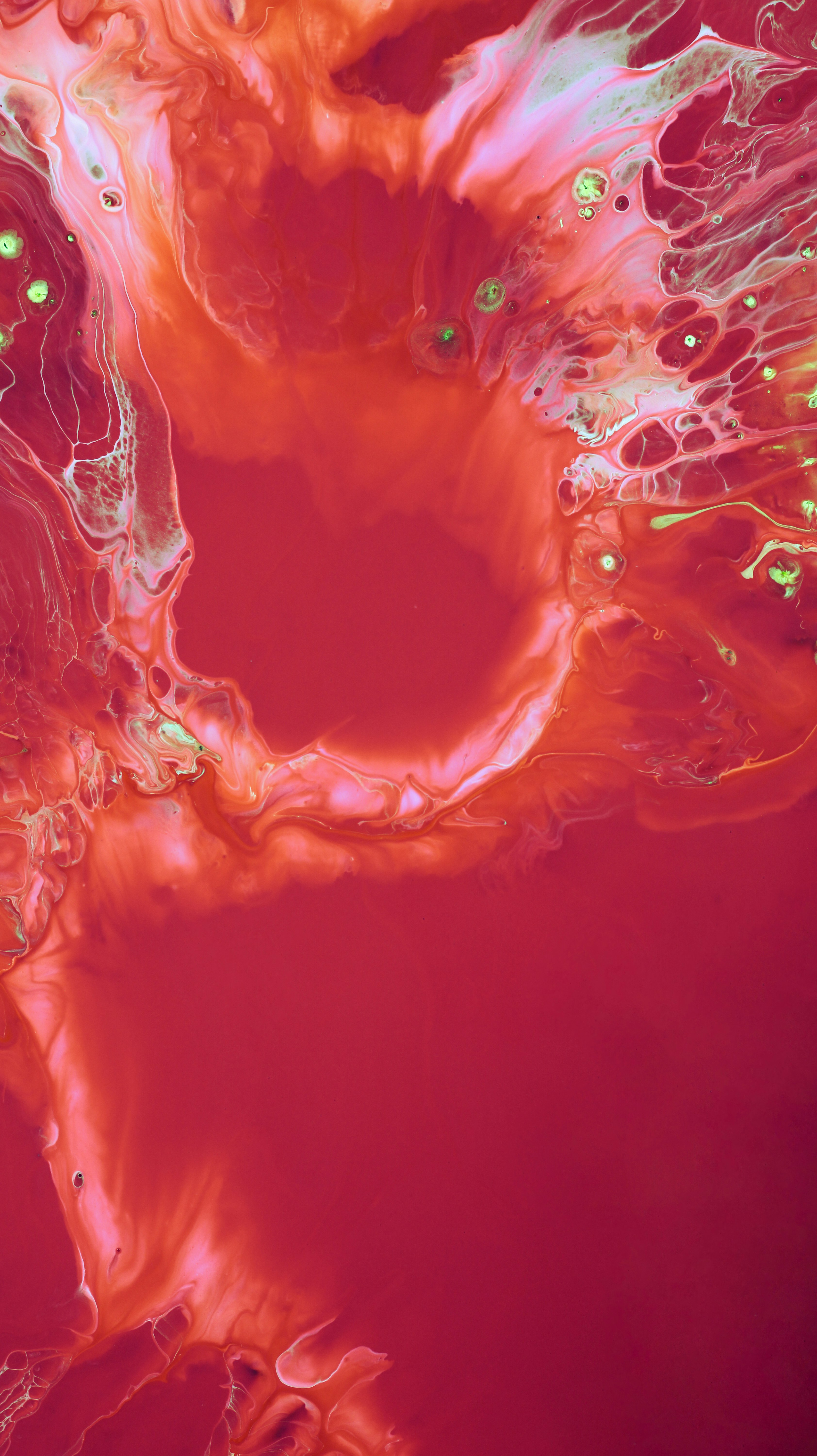 a close up of a cell phone with a red background