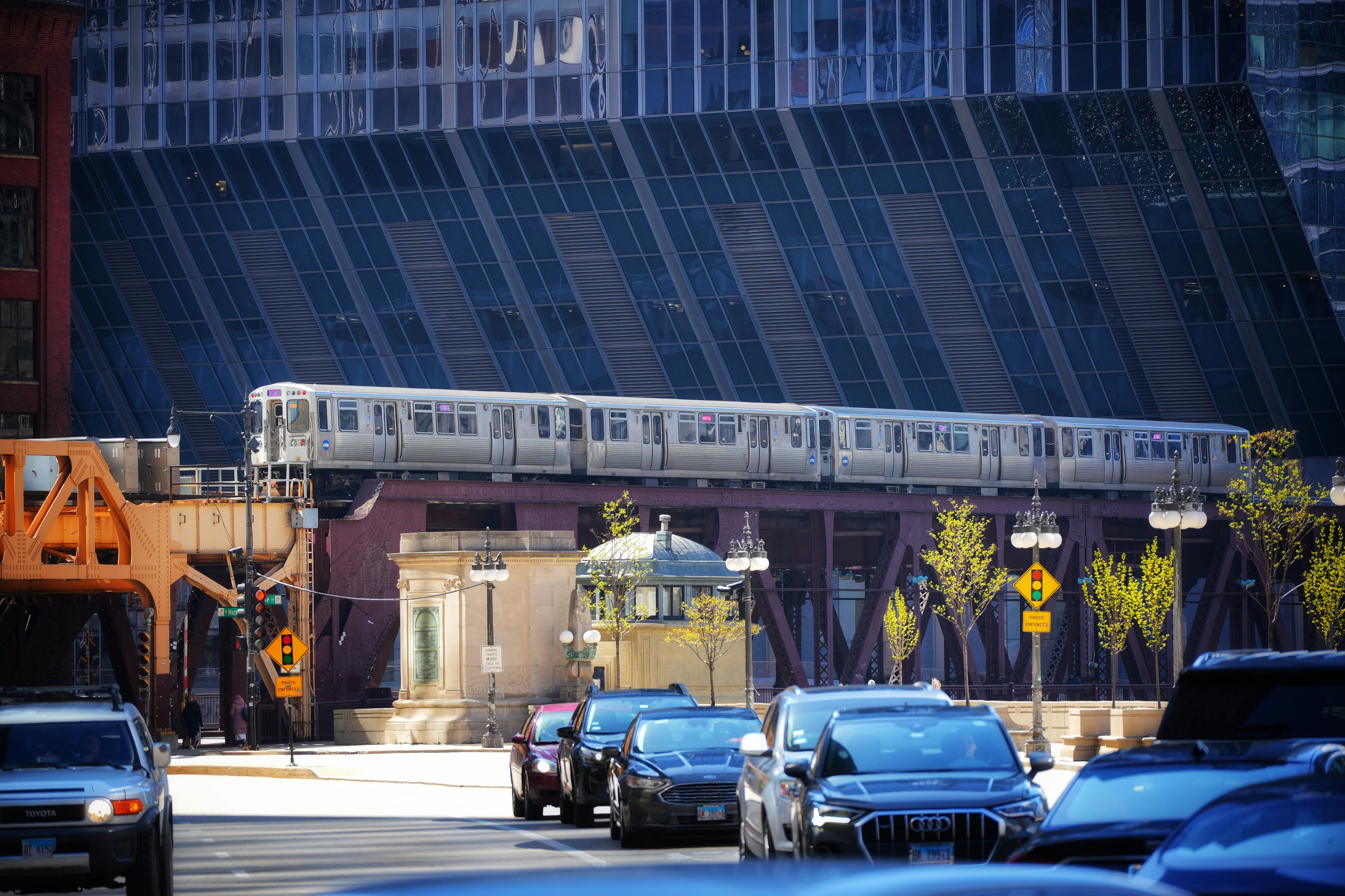 CTA train at Roosevelt station with South Loop buildings in background - 1 bedroom apartments south loop chicago