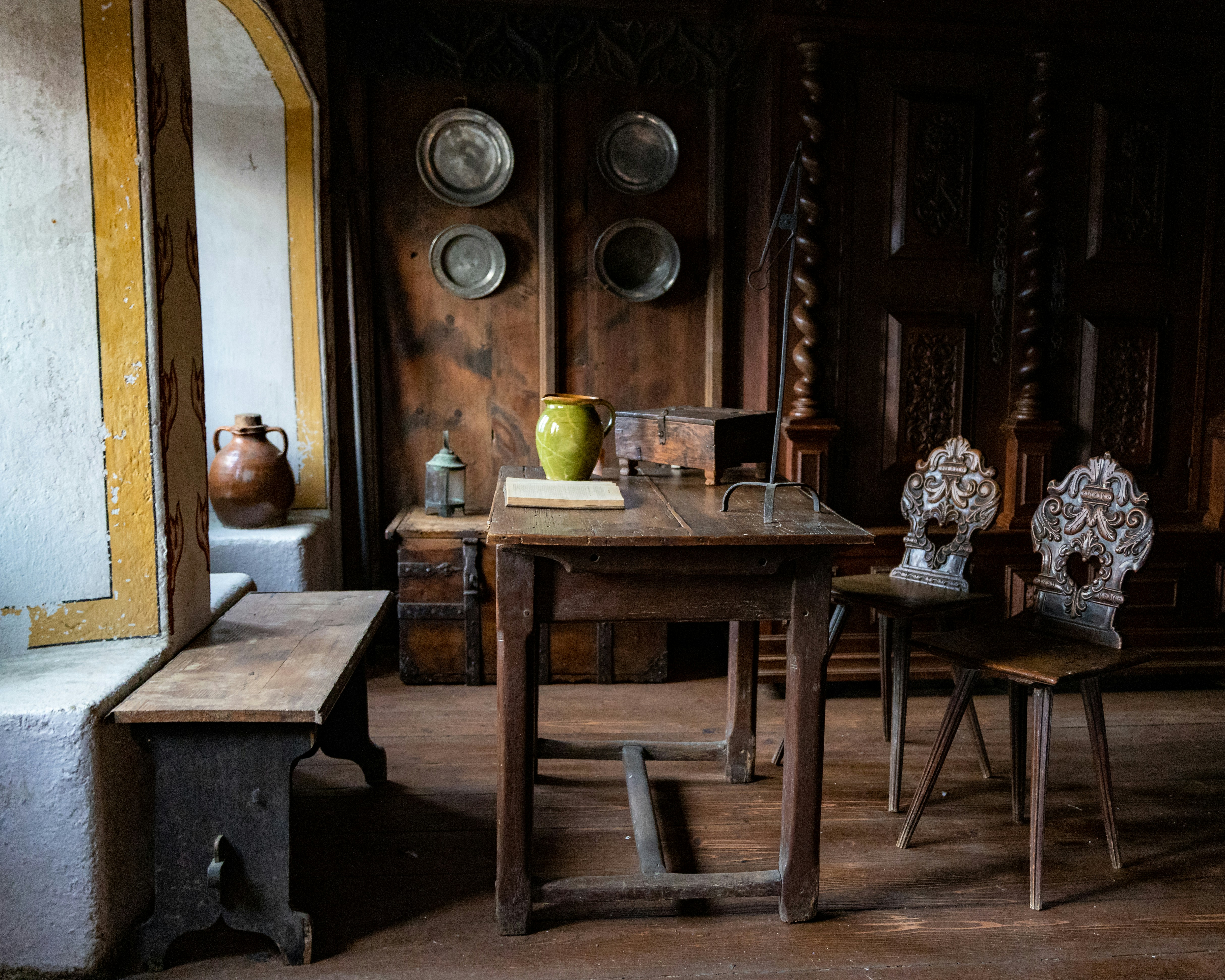 a room with a table and two chairs